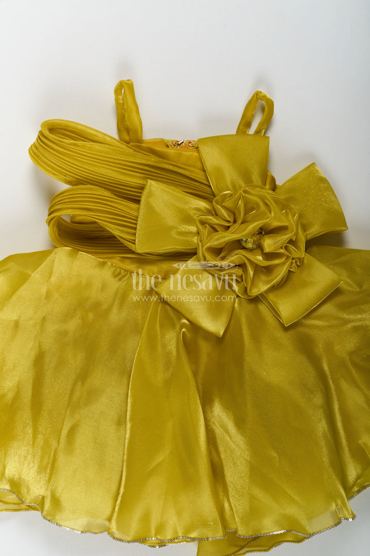 The Nesavu Girls Fancy Party Frock Girls Trendy Frock in Glossy Satin with Floral Waist Embellishment and Flowy Asymmetrical Hem Nesavu Girls Trendy Frock Glossy Satin Flowy Hem Floral Bow Embellishment | The Nesavu