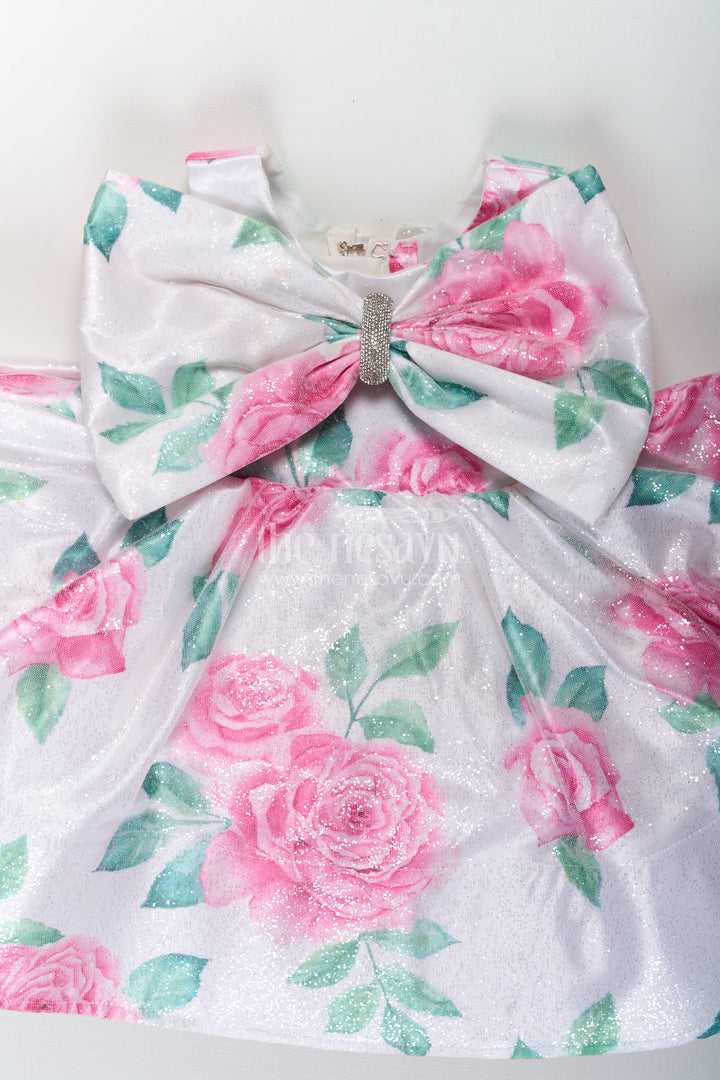 The Nesavu Girls Fancy Party Frock Girls Trendy Frocks in Satin Glitter with Floral Digital Print and Statement Bow Nesavu Girls Trendy Frocks Satin Glitter Pink Floral Print Big Front Bow | The Nesavu