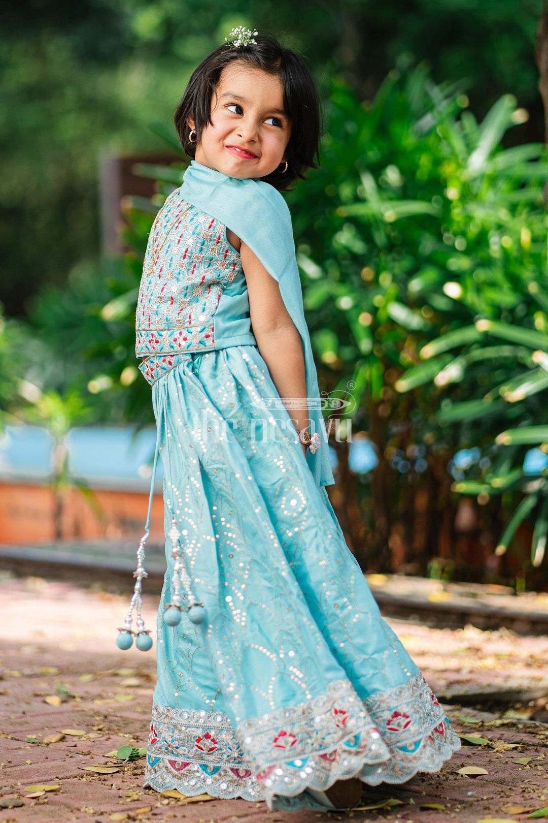 The Nesavu Girls Lehenga Choli Girls Turquoise Lehenga Choli with Delicate Floral Embroidery and Bold Hem Detailing for Special Occasions Nesavu Nesavu Girls Aqua Lehenga Choli Sequin Embroidery Bold Hemline Festive Events