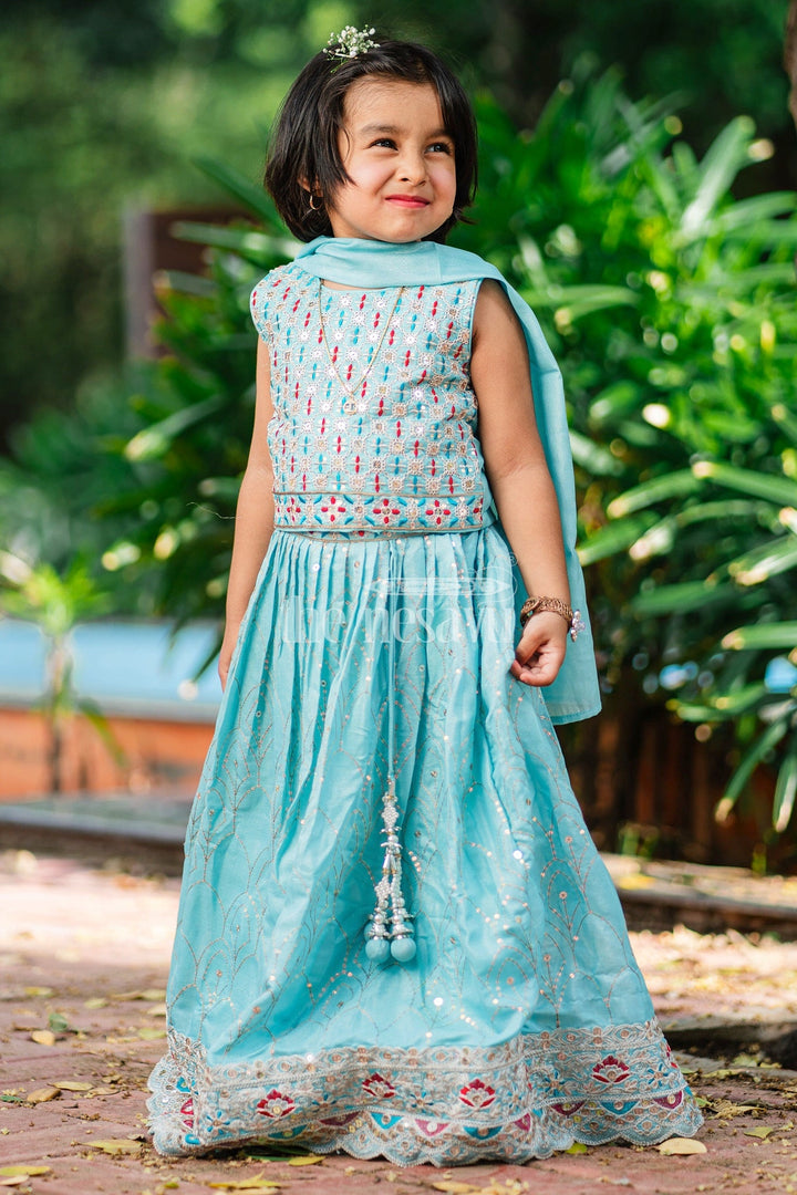 The Nesavu Girls Lehenga Choli Girls Turquoise Lehenga Choli with Delicate Floral Embroidery and Bold Hem Detailing for Special Occasions Nesavu Nesavu Girls Aqua Lehenga Choli Sequin Embroidery Bold Hemline Festive Events