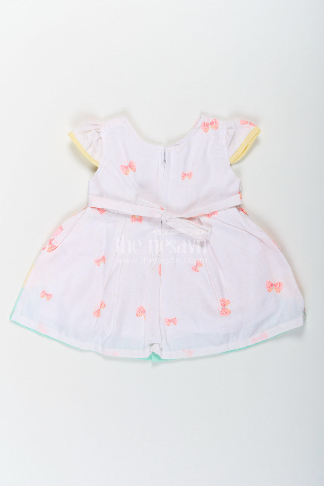 The Nesavu Baby Cotton Frocks Girls Ugadi Special Frock Dress in Soft Cotton with Pastel Floral Print and Yellow Bow Detail Nesavu Girls Cotton Ugadi Special Frock Dress Floral Print Yellow Waist Bow Festive Comfort | The Nesavu