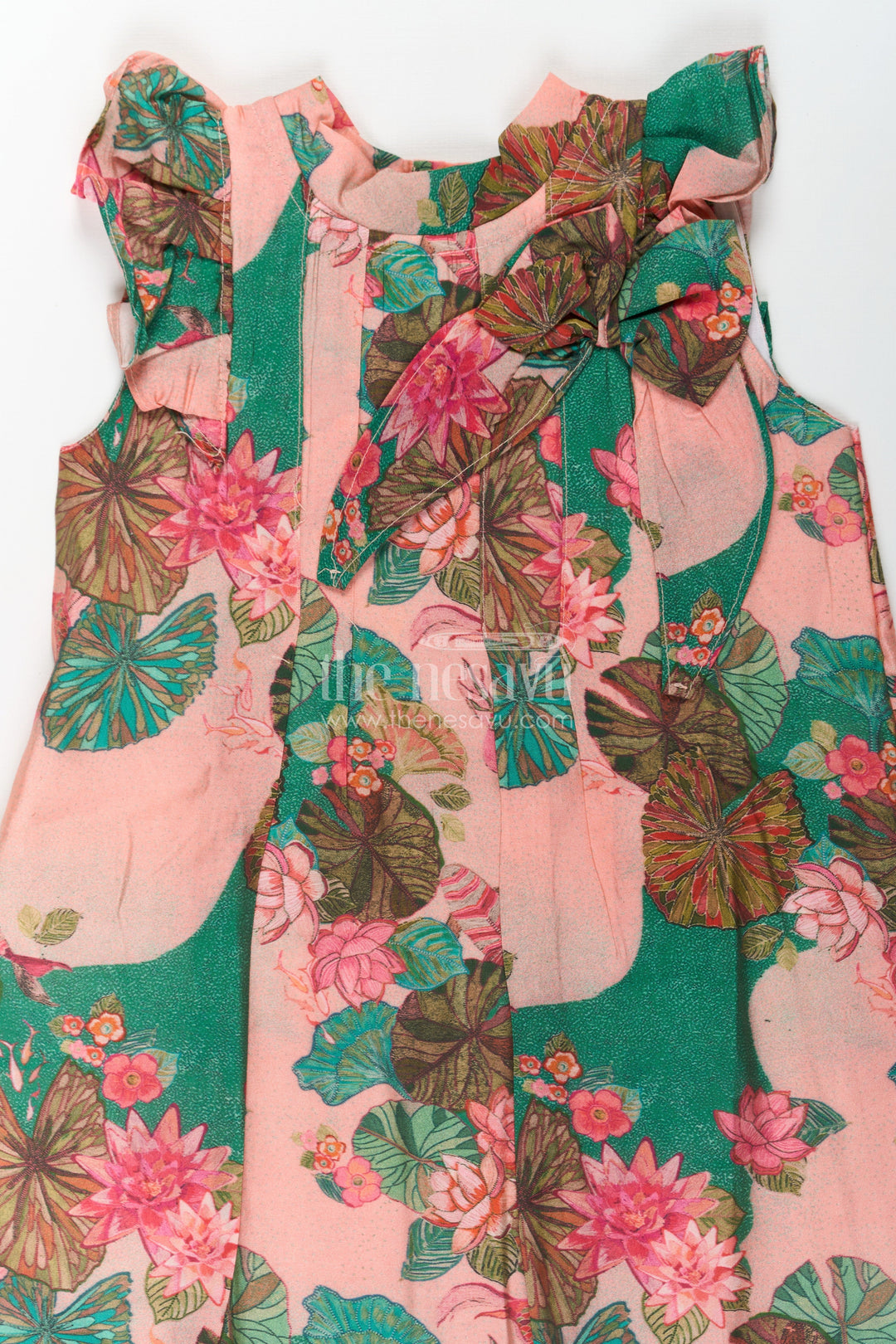 The Nesavu Girls Cotton Frock Girls Viscose Silk Frock Floral Design with Lotus Print and Pleated Details for Comfortable Daywear Nesavu Girls Frock Floral Design Viscose Silk Lotus Motifs Soft Ruffled Sleeves | The Nesavu