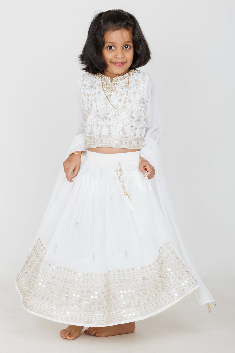 The Nesavu Girls Lehenga Choli Girls White and Gold Georgette Lehenga Choli with Intricate Embroidery and 3/4 Sleeves Dupatta Set Nesavu Nesavu Girls White Gold Georgette Lehenga Choli 34 Sleeves Embroidered Dupatta