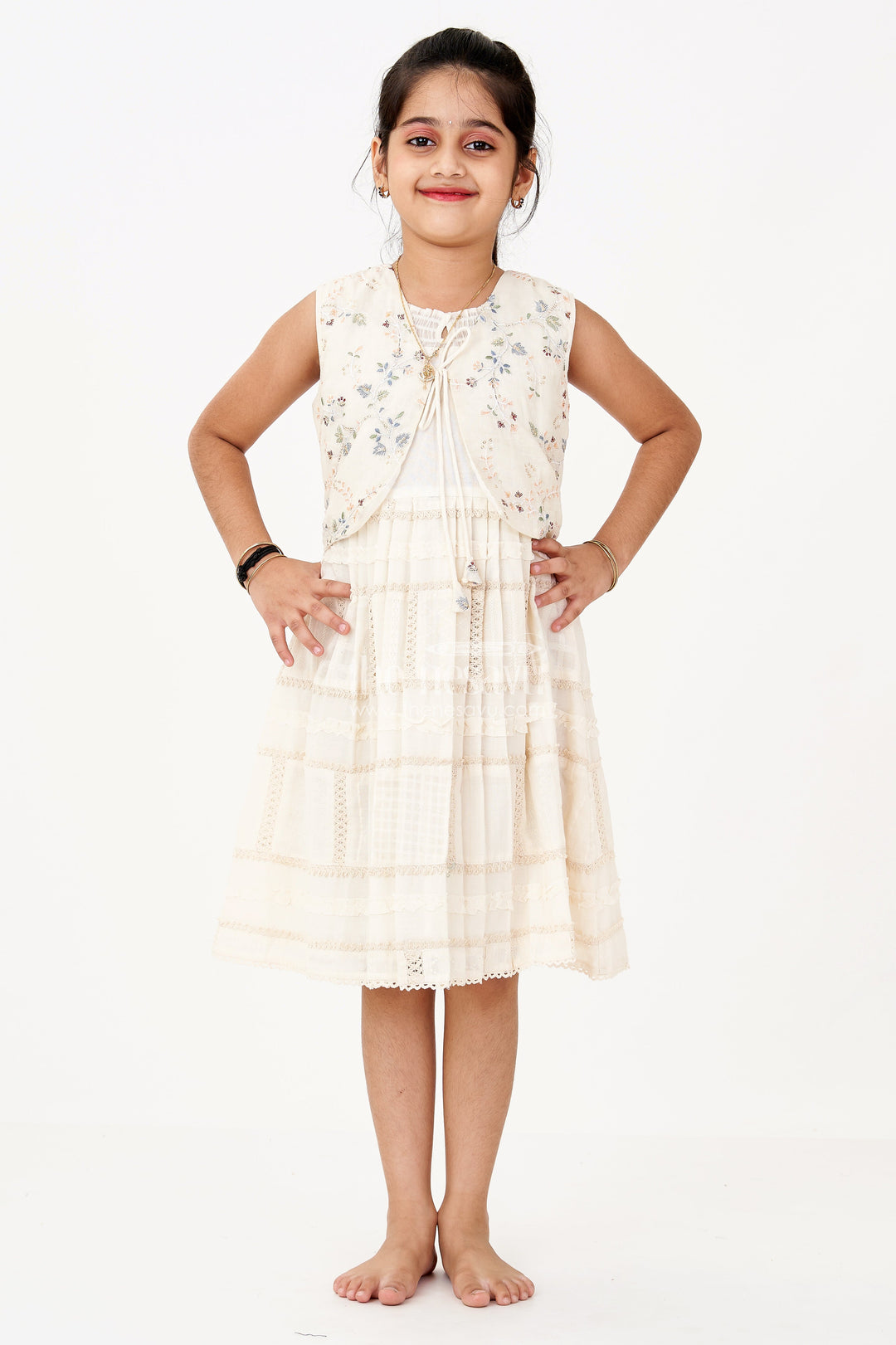 The Nesavu Girls Cotton Frock Girls White Color Frock with Embroidery and Layered Pleats for Graceful Festive Wear Nesavu Girls White Color Cotton Frock Embroidery Layered Pleats Festive Wear | The Nesavu
