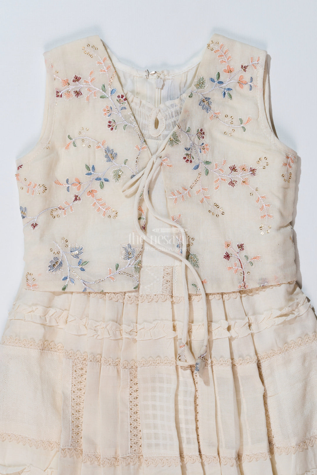 The Nesavu Girls Cotton Frock Girls White Color Frock with Embroidery and Layered Pleats for Graceful Festive Wear Nesavu Nesavu Girls White Color Cotton Frock Embroidery Layered Pleats Festive Wear