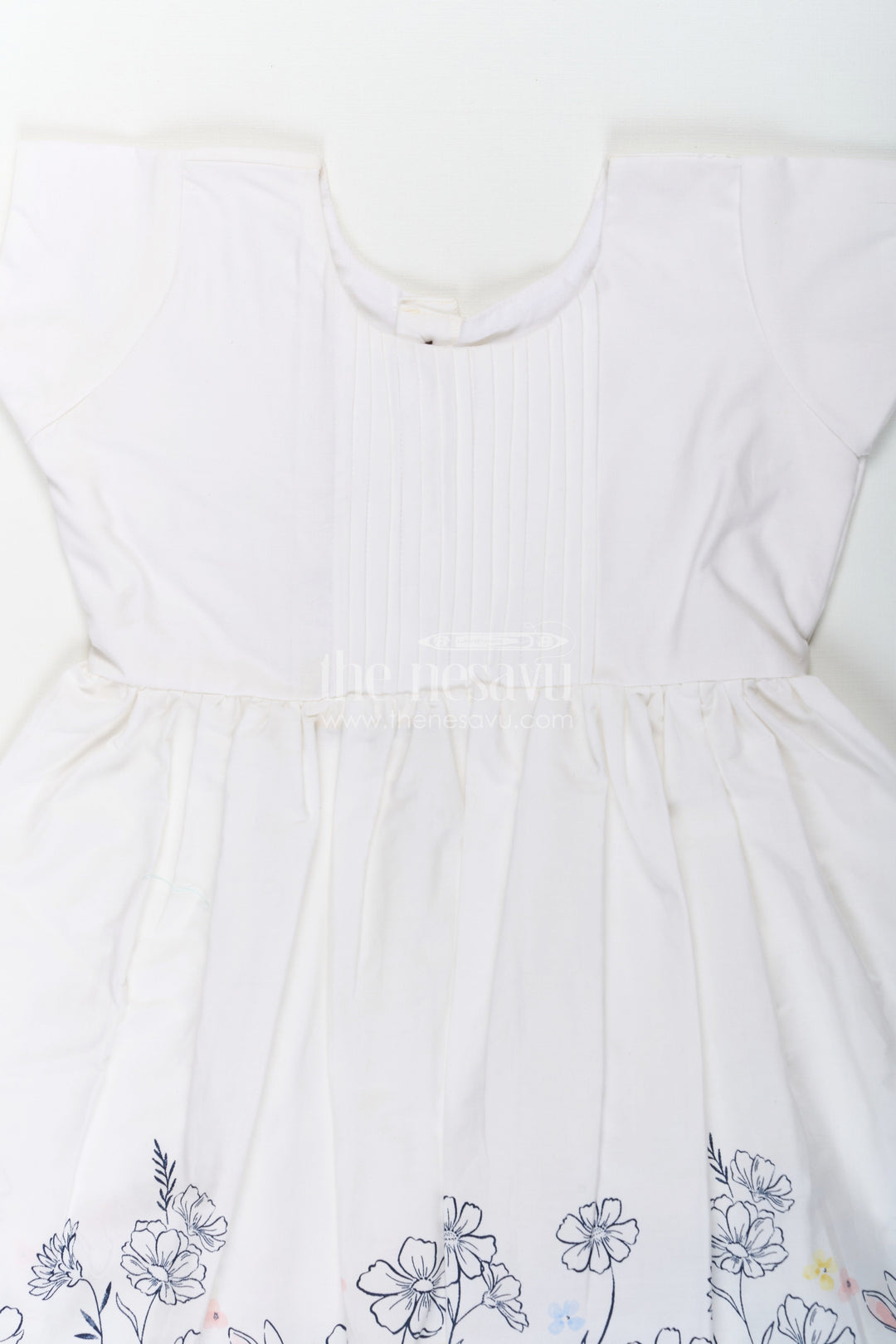 The Nesavu Girls Cotton Frock Girls White Frock Dress in Cotton with Digital Bunny Border and Pintuck Front Panel Nesavu Nesavu Girls White Frock Dress Cotton Digital Bunny Floral Border Pintuck Front