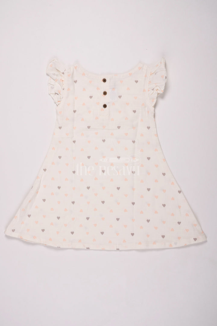 The Nesavu Girls Cotton Frock Girls White Muslin Cotton Christmas Dress with Heart Print and Ruffle Details Nesavu Nesavu Girls White Muslin Cotton Christmas Dress Heart Print Ruffles