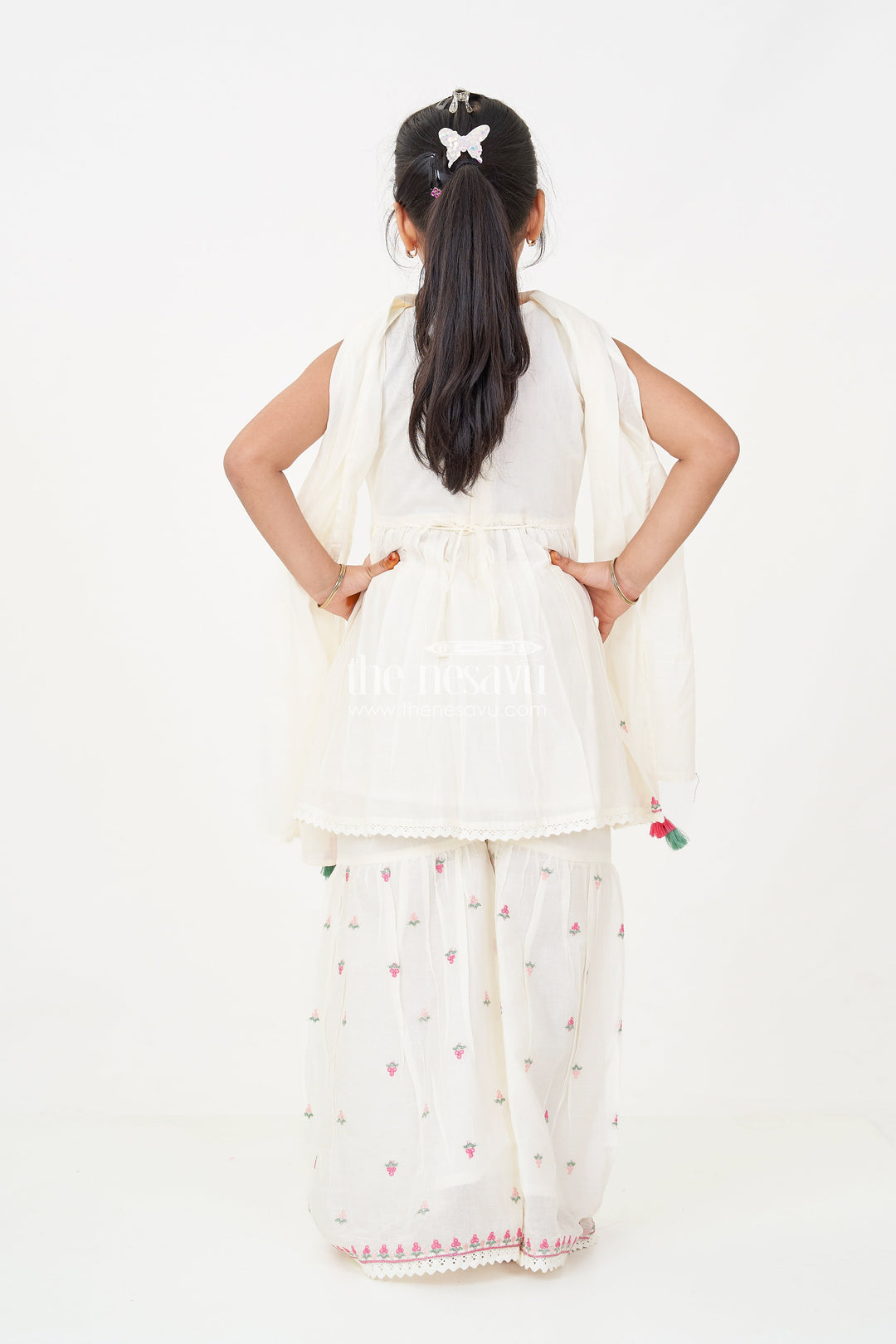 The Nesavu Girls Sharara / Plazo Set Girls White Sharara Set with Floral Embroidered Cotton Kurti and Tassel Dupatta for Graceful Outings Nesavu Girls white sharara set Floral Cotton Embroidery Tassel Dupatta Festive Wear | The Nesavu