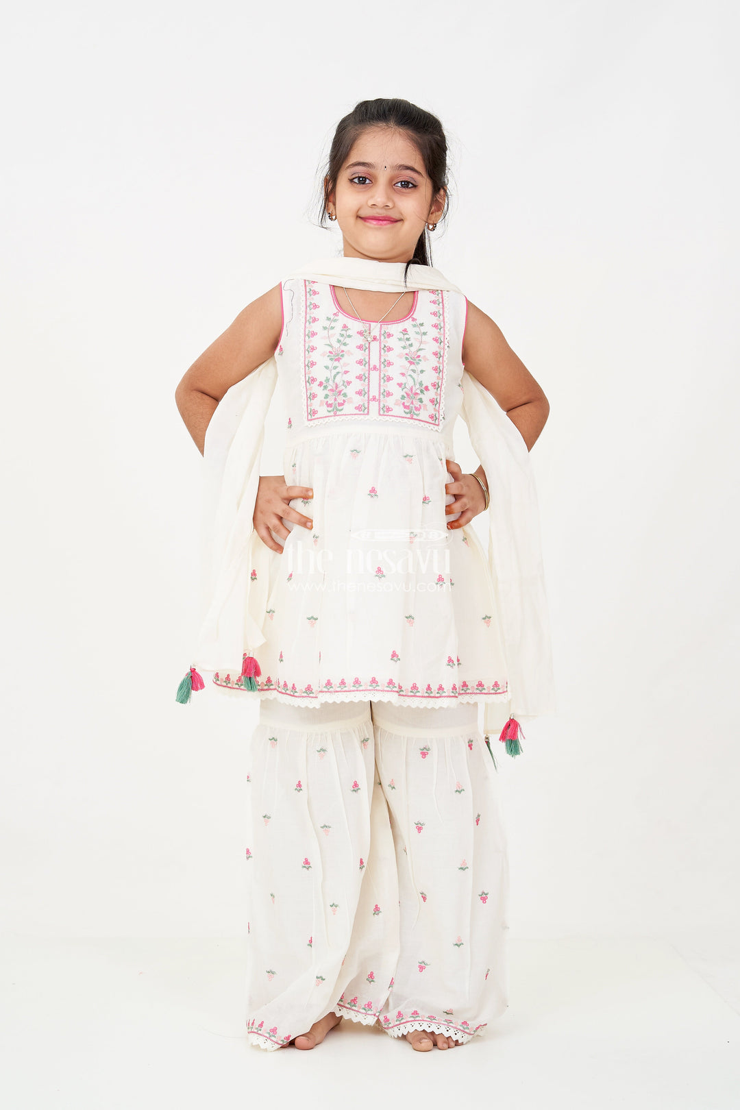 The Nesavu Girls Sharara / Plazo Set Girls White Sharara Set with Floral Embroidered Cotton Kurti and Tassel Dupatta for Graceful Outings Nesavu Girls white sharara set Floral Cotton Embroidery Tassel Dupatta Festive Wear | The Nesavu