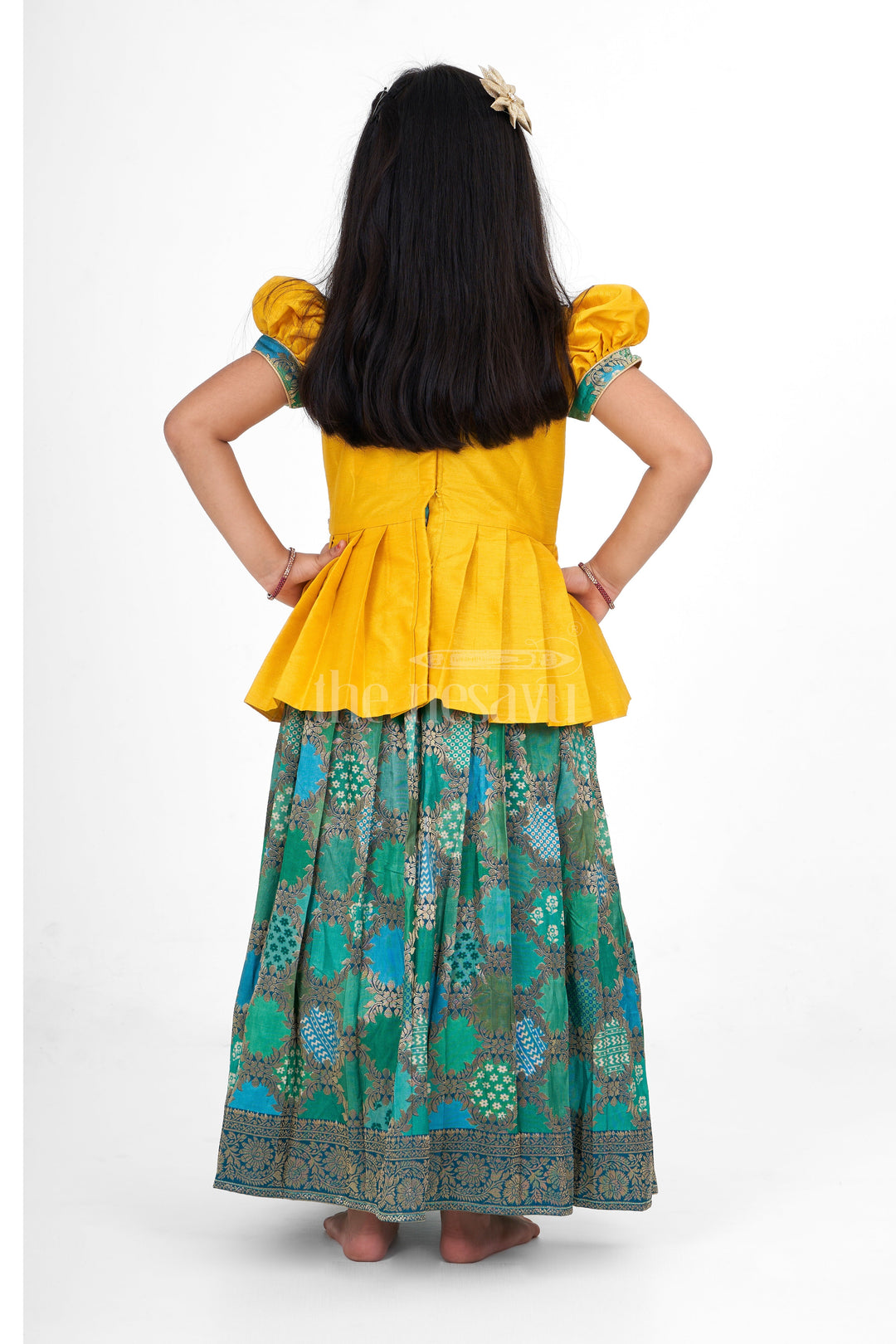 The Nesavu Pattu Pavadai Girls Yellow and Green Pattu Pavadai Set with Puff Sleeves and Beaded Waistline Detailing Nesavu Nesavu Girls Pattu Pavadai Yellow Green Puff Sleeves Beaded Waistline