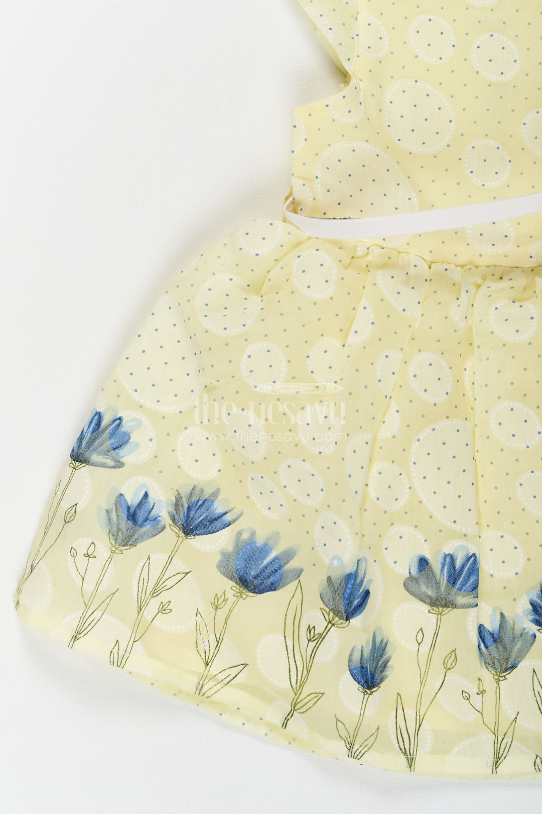 The Nesavu Baby Cotton Frocks Girls Yellow Cotton Blend Polka Dot Frock with Blue Floral Hem and Flared Sleeves for Baby Wear Nesavu Baby Girls Yellow Polka Dot Cotton Frock Blue Floral Border Soft Blend Fabric | The Nesavu