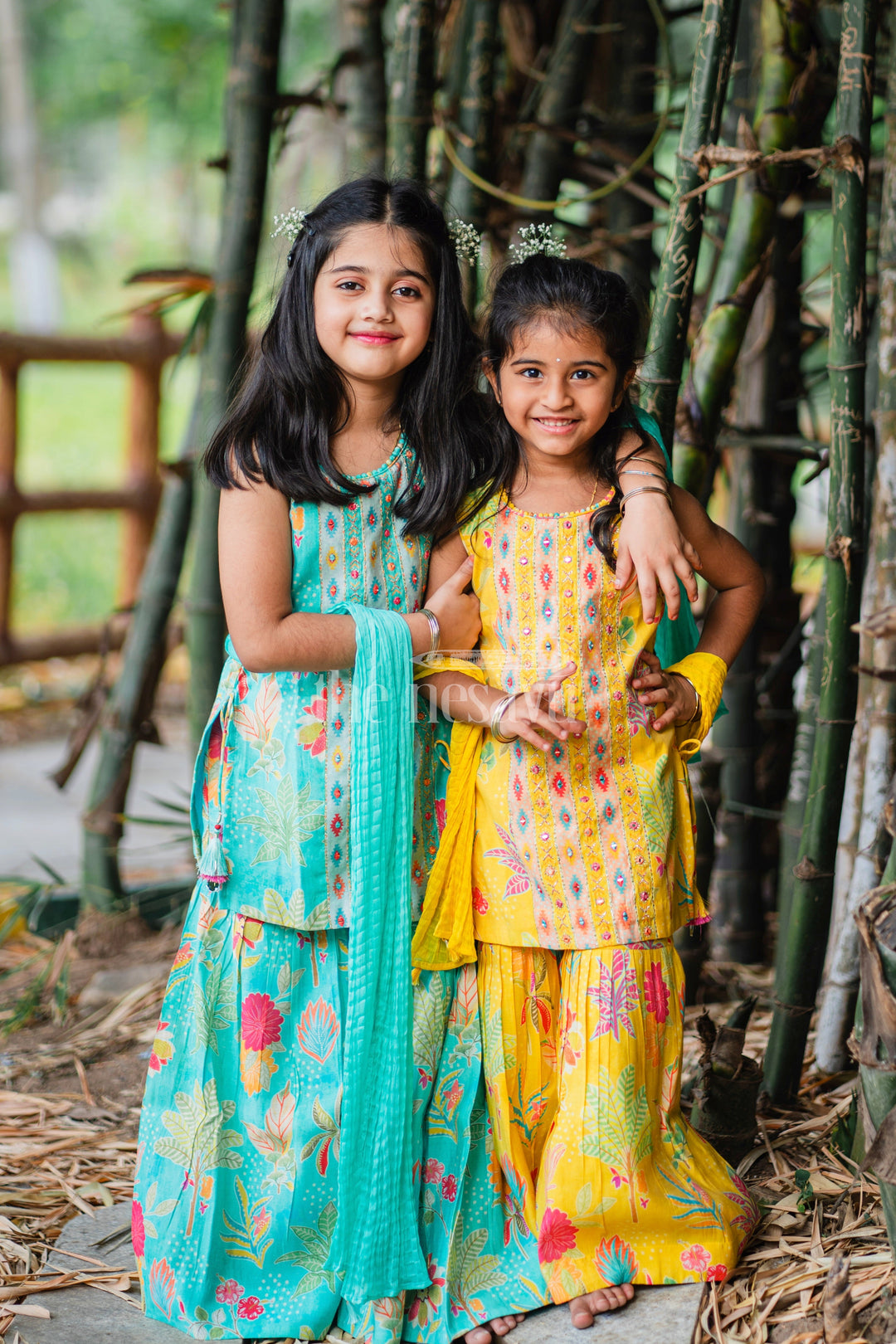 The Nesavu Girls Sharara / Plazo Set Girls Yellow Sharara Plazo Set with Floral and Ethnic-Inspired Patterns Nesavu Nesavu Girls Yellow Sharara Plazo Set Floral Print Embroidered Top