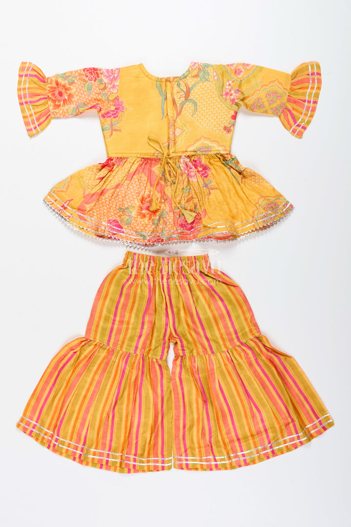 The Nesavu Girls Sharara / Plazo Set Girls yellow sharara set with ethnic floral print for festive functions Nesavu Nesavu girls yellow sharara set ethnic floral print striped pants  festive wear toddlers