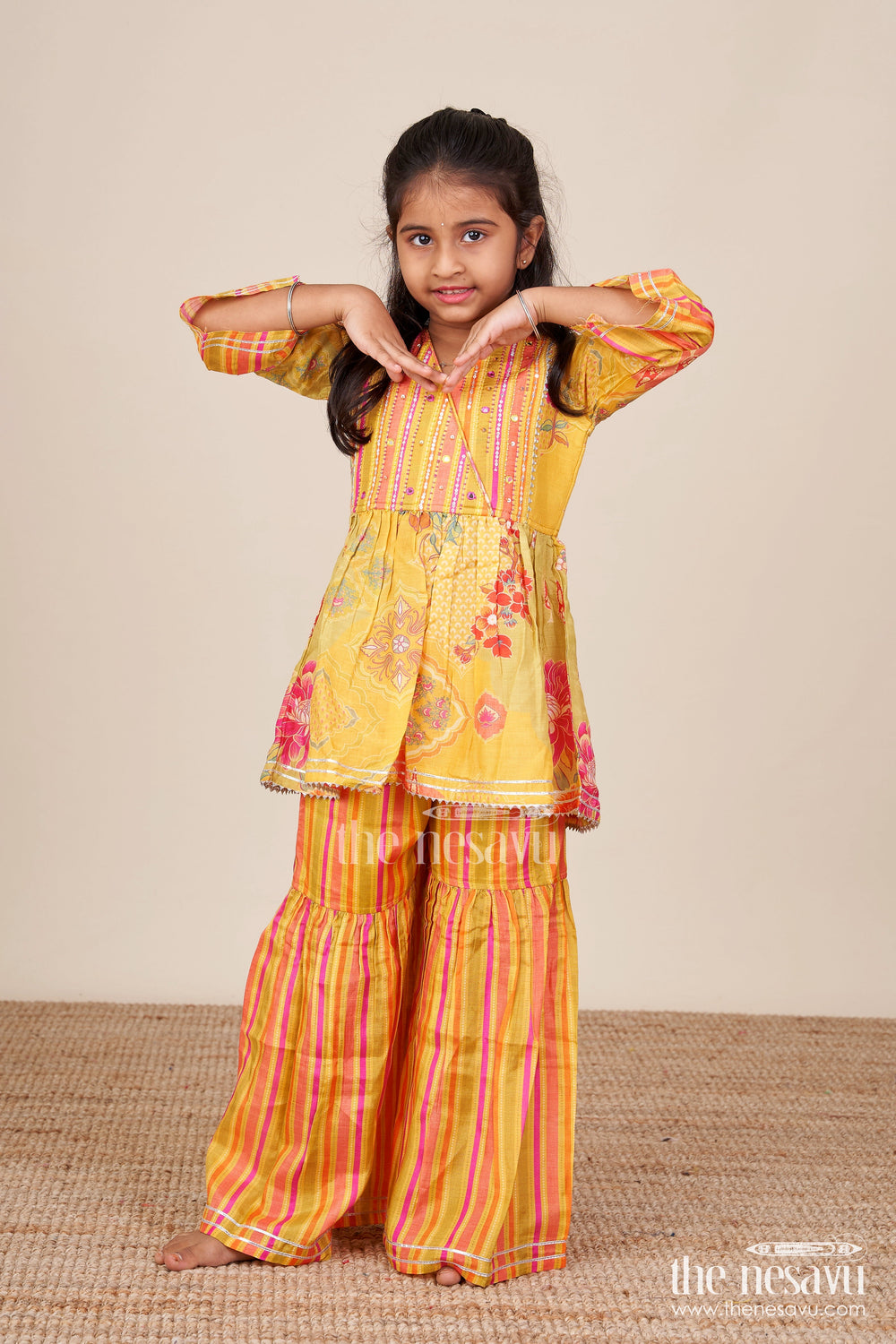 The Nesavu Girls Sharara / Plazo Set Girls Yellow Sharara Set with Ethnic Floral Print for Festive Functions Nesavu Nesavu girls yellow sharara set ethnic floral print striped pants  festive wear toddlers