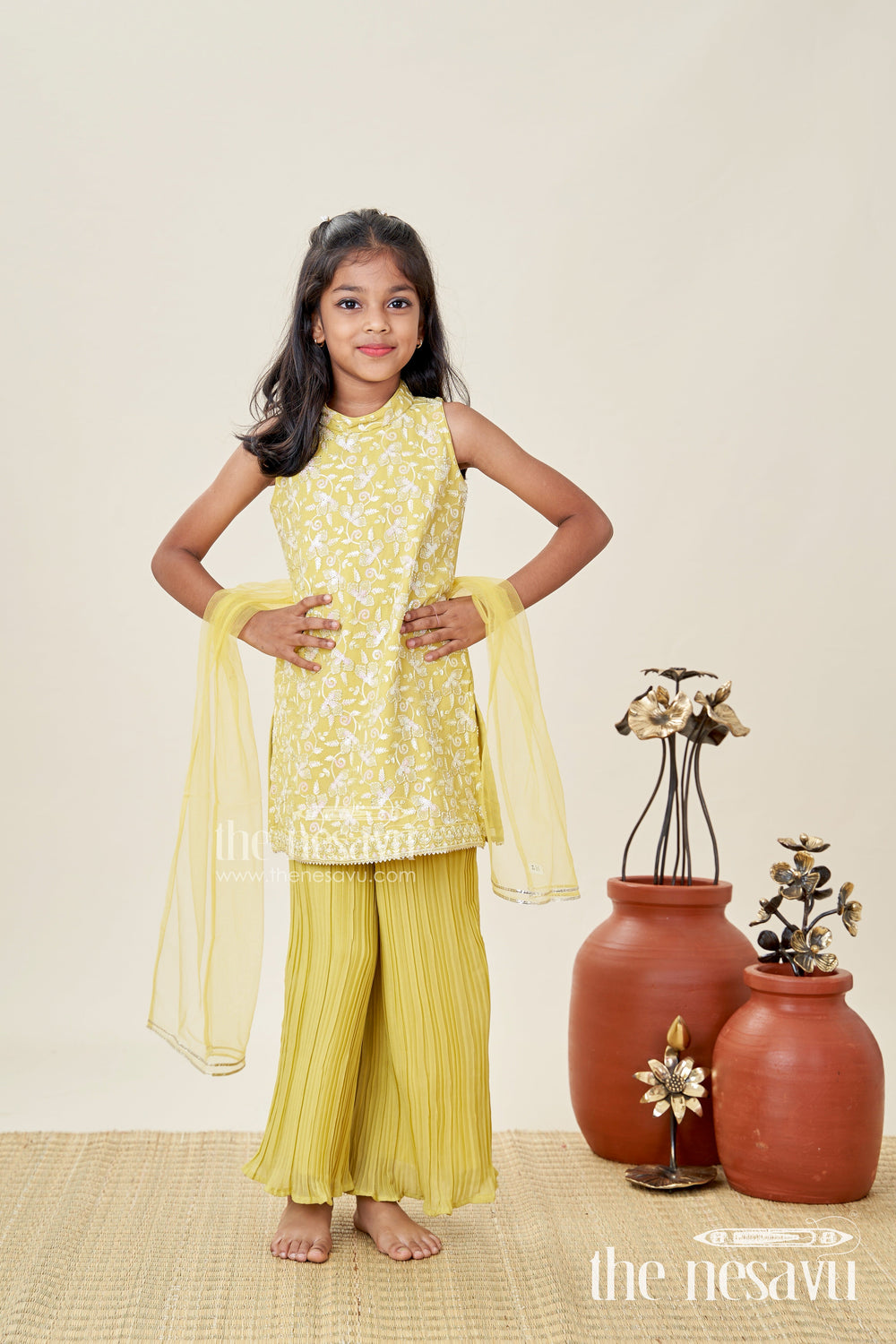 The Nesavu Girls Sharara / Plazo Set Girls Yellow Sharara Set with Sequin High-Neck Top and Flared Pants Nesavu Nesavu Yellow Embroidered Sharara Set Girls High Neck Sequin Top Pleated Pants