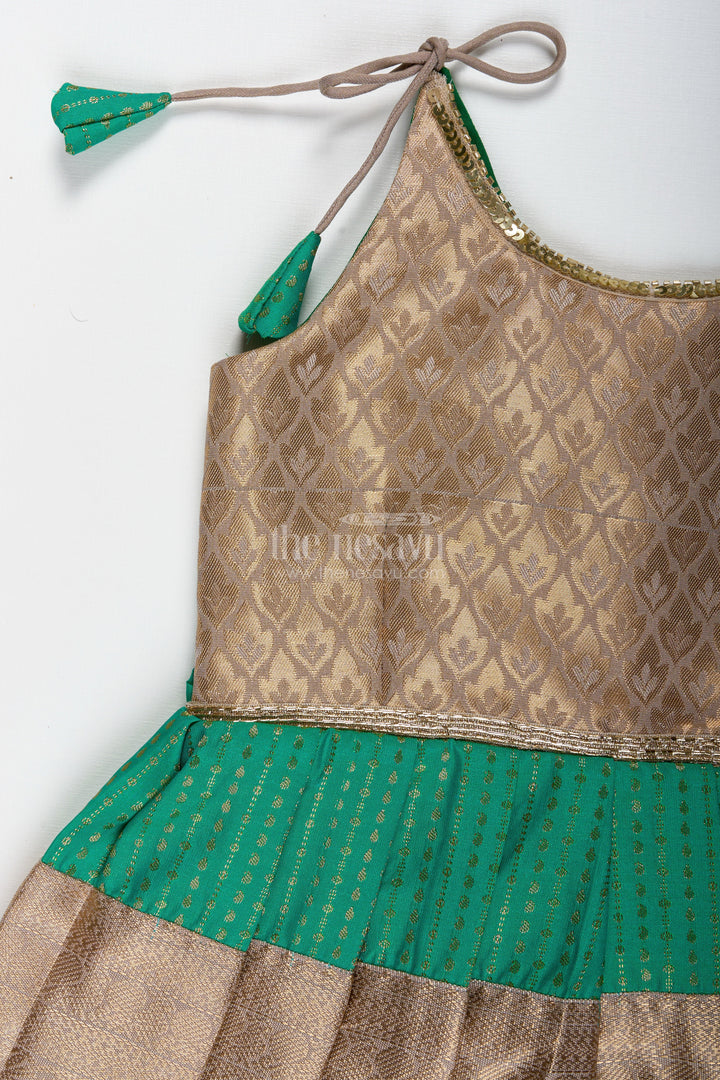 The Nesavu Tie-up Frock Gold and Green Frock for Baby Girls Semi Silk Ethnic Dress with Brocade Detailing Nesavu Nesavu Gold And Green Semi Silk Frock For Baby Girls Ethnic Brocade Tie-Up Dress For Weddings