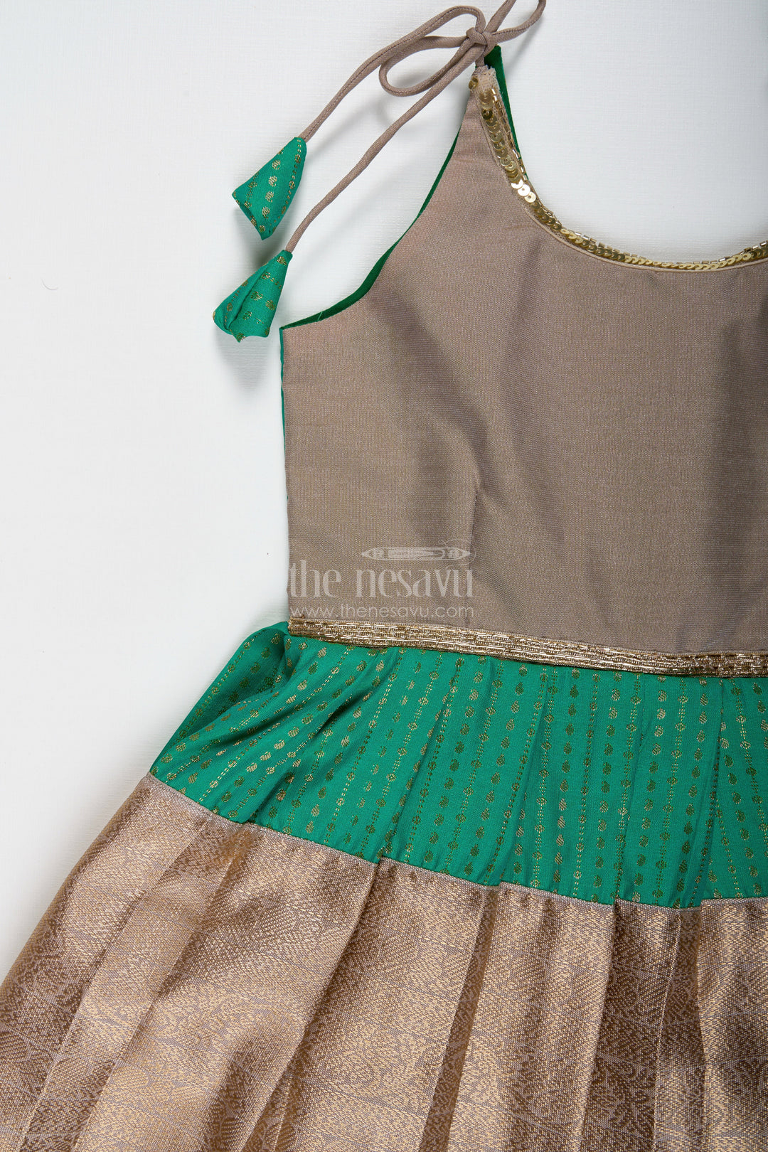 The Nesavu Tie-up Frock Gold and Green Frock for Baby Girls Semi Silk Ethnic Dress with Brocade Detailing Nesavu Nesavu Gold And Green Semi Silk Frock For Baby Girls Ethnic Brocade Tie-Up Dress For Weddings