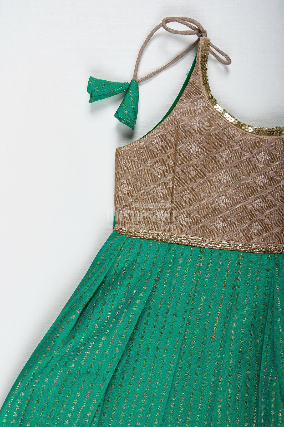 The Nesavu Tie-up Frock Gold and Green Frock for Baby Girls Semi Silk Ethnic Dress with Brocade Detailing Nesavu Nesavu Gold And Green Semi Silk Frock For Baby Girls Ethnic Brocade Tie-Up Dress For Weddings