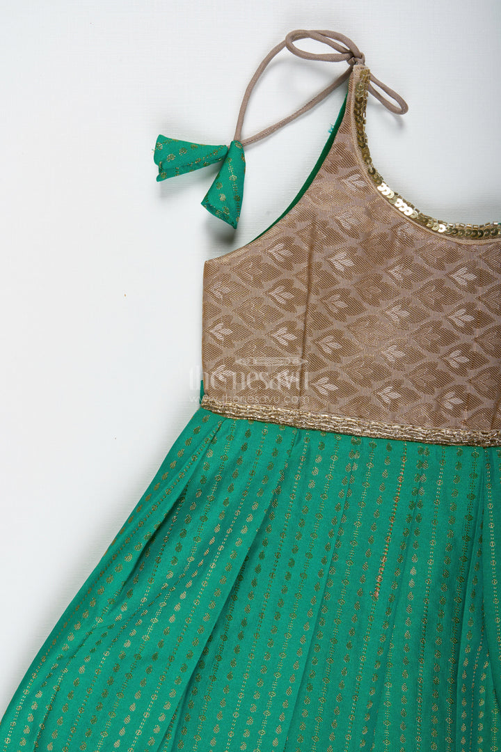 The Nesavu Tie-up Frock Gold and Green Frock for Baby Girls Semi Silk Ethnic Dress with Brocade Detailing Nesavu Nesavu Gold And Green Semi Silk Frock For Baby Girls Ethnic Brocade Tie-Up Dress For Weddings