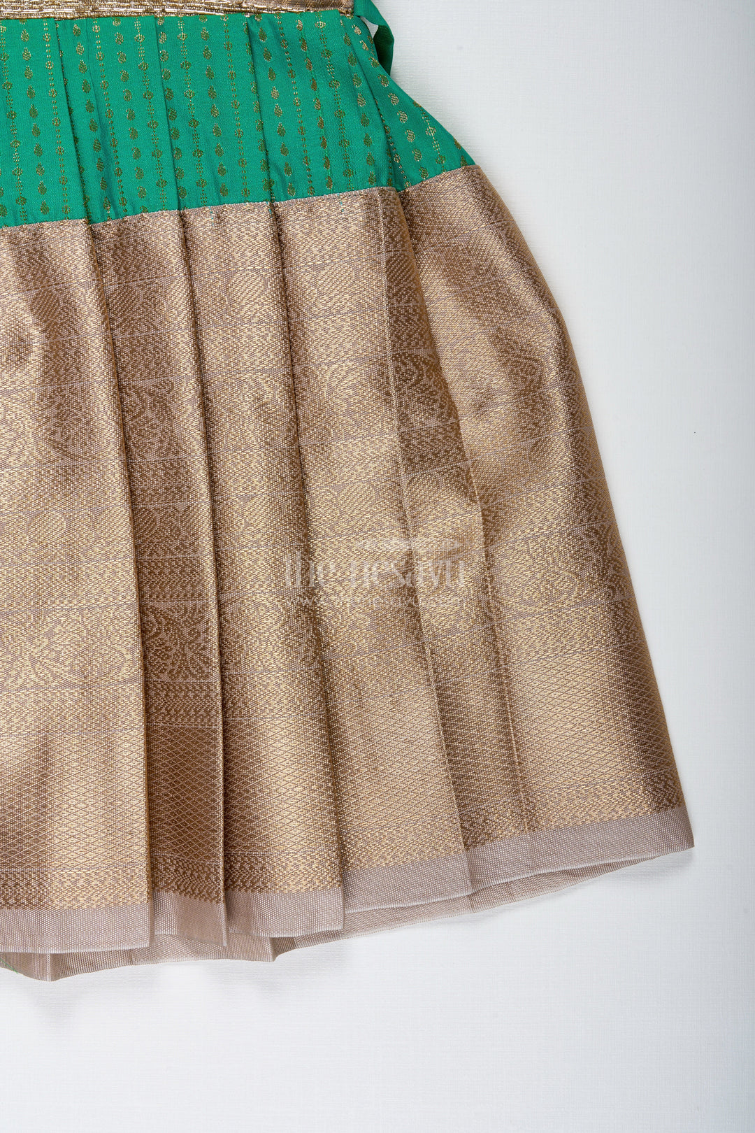 The Nesavu Tie-up Frock Gold and Green Frock for Baby Girls Semi Silk Ethnic Dress with Brocade Detailing Nesavu Nesavu Gold And Green Semi Silk Frock For Baby Girls Ethnic Brocade Tie-Up Dress For Weddings