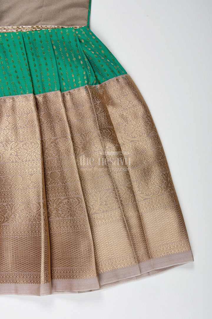 The Nesavu Tie-up Frock Gold and Green Frock for Baby Girls Semi Silk Ethnic Dress with Brocade Detailing Nesavu Nesavu Gold And Green Semi Silk Frock For Baby Girls Ethnic Brocade Tie-Up Dress For Weddings