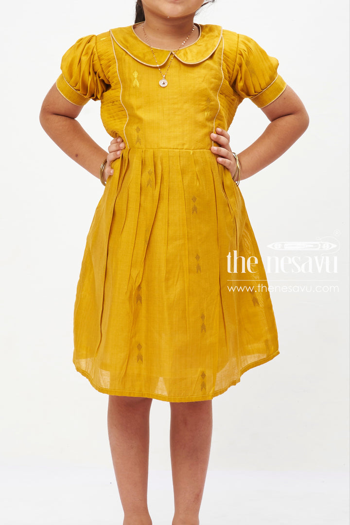 The Nesavu Girls Cotton Frock Golden Sunshine Puff Sleeve Dress: Girls' Mustard Yellow Frock with Shimmer Accents Nesavu Vibrant Mustard Yellow Girls Dress with Puff Sleeves | Shimmering Party Frock | The Nesavu