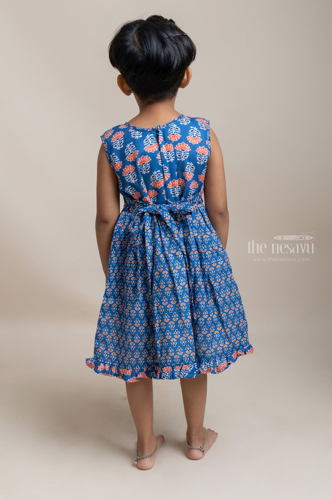 The Nesavu Girls Fancy Frock Gorgeous Blue Pleated Yoke With Floral Printed Sleeveless Cotton Frock For Girls Nesavu Pretty Floral Printed Cotton Frock For Girls | Trendy Cotton Frocks | The Nesavu