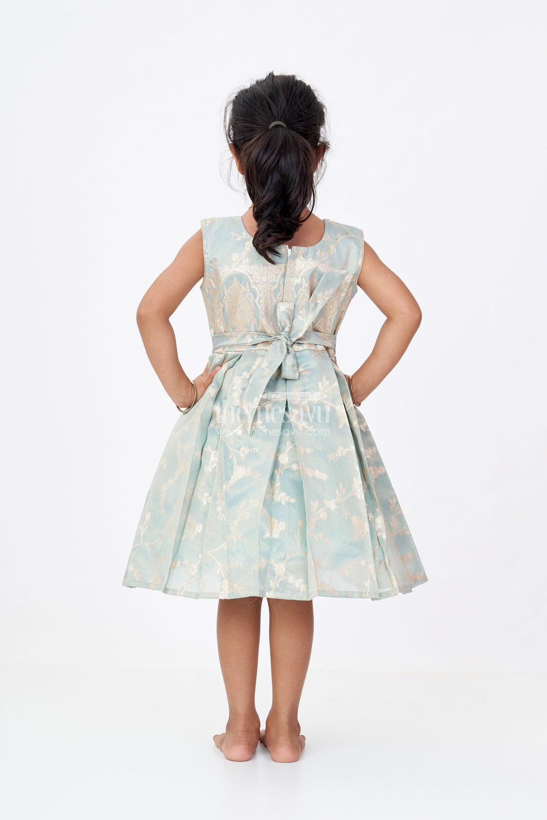 The Nesavu Silk Party Frock Graceful Girls Blue Silk Frock in Banarasi Jacquard with Gold Zari Patterns Nesavu Girls Blue Silk Frock Banarasi Jacquard Gold Zari Embellishments | The Nesavu