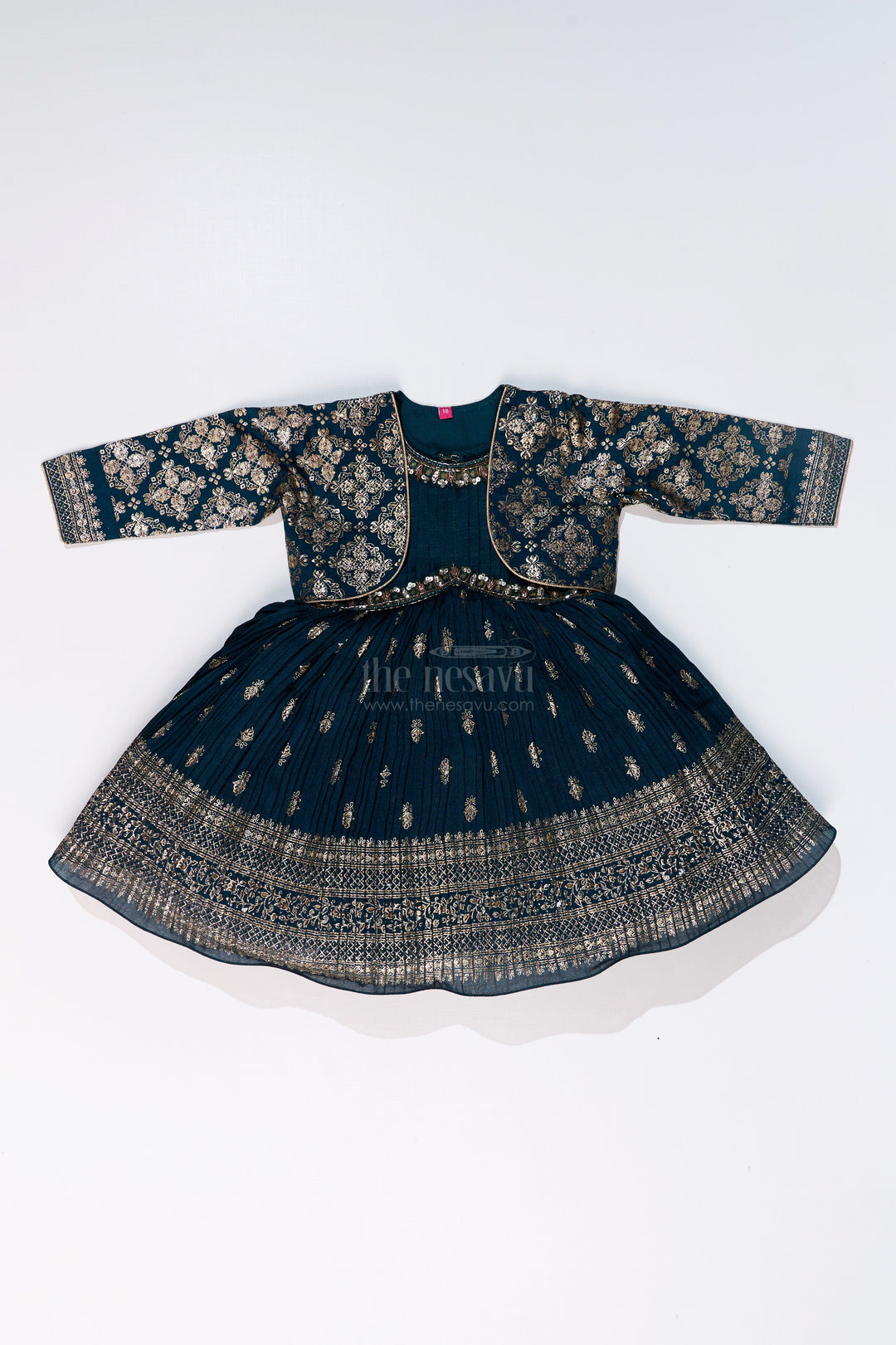 The Nesavu Silk Frock Graceful Girls Green Silk Dress with Gold Foil Prints and Traditional Embellished Yoke Nesavu Girls Green Silk Dress Gold Foil Prints Embroidered Yoke Special Occasions | The Nesavu