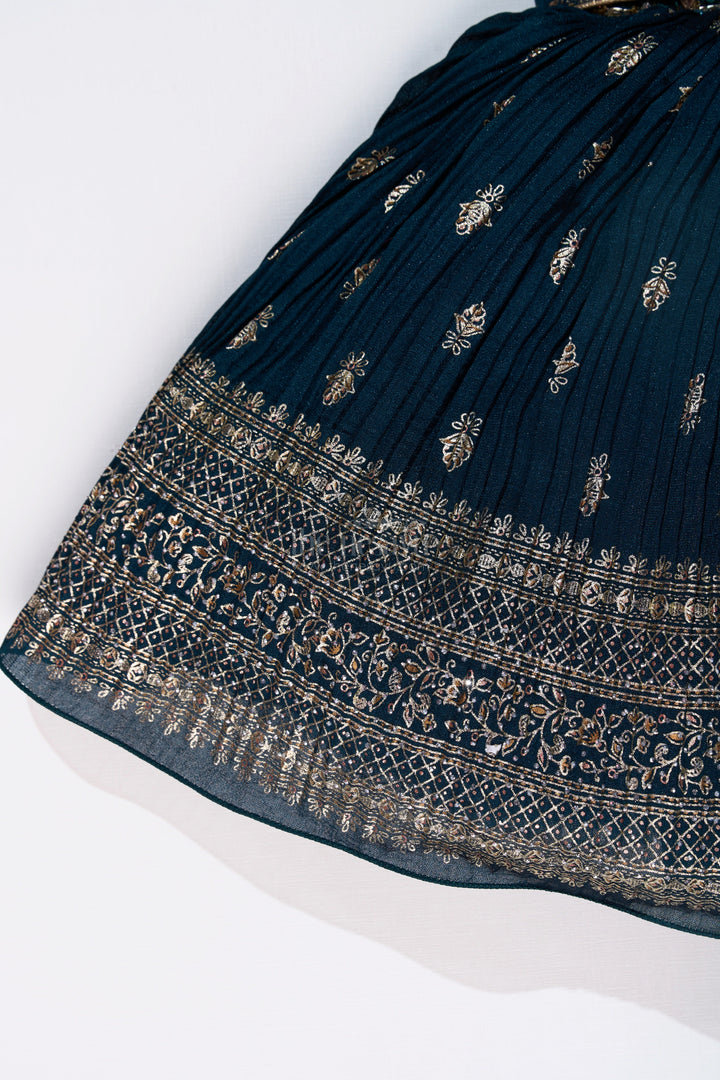The Nesavu Silk Frock Graceful Girls Green Silk Dress with Gold Foil Prints and Traditional Embellished Yoke Nesavu Nesavu Girls Green Silk Dress Gold Foil Prints Embroidered Yoke Special Occasions