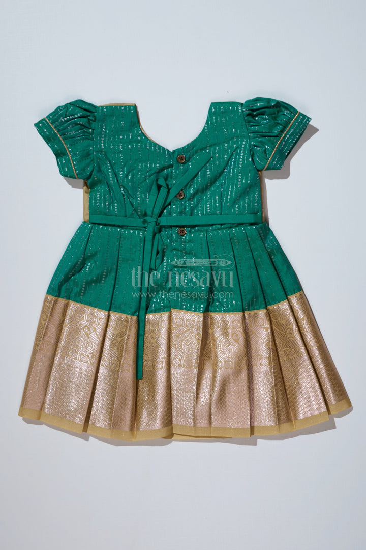 The Nesavu Girls Kanchi Silk Frock Graceful Green Silk Dress for Girls with Kanchipuram Inspired Fabric and Gold Zari Pleated Border Nesavu Green Silk Dress Girls Kanchipuram Inspired Fabric Gold Zari Pleated Border | The Nesavu