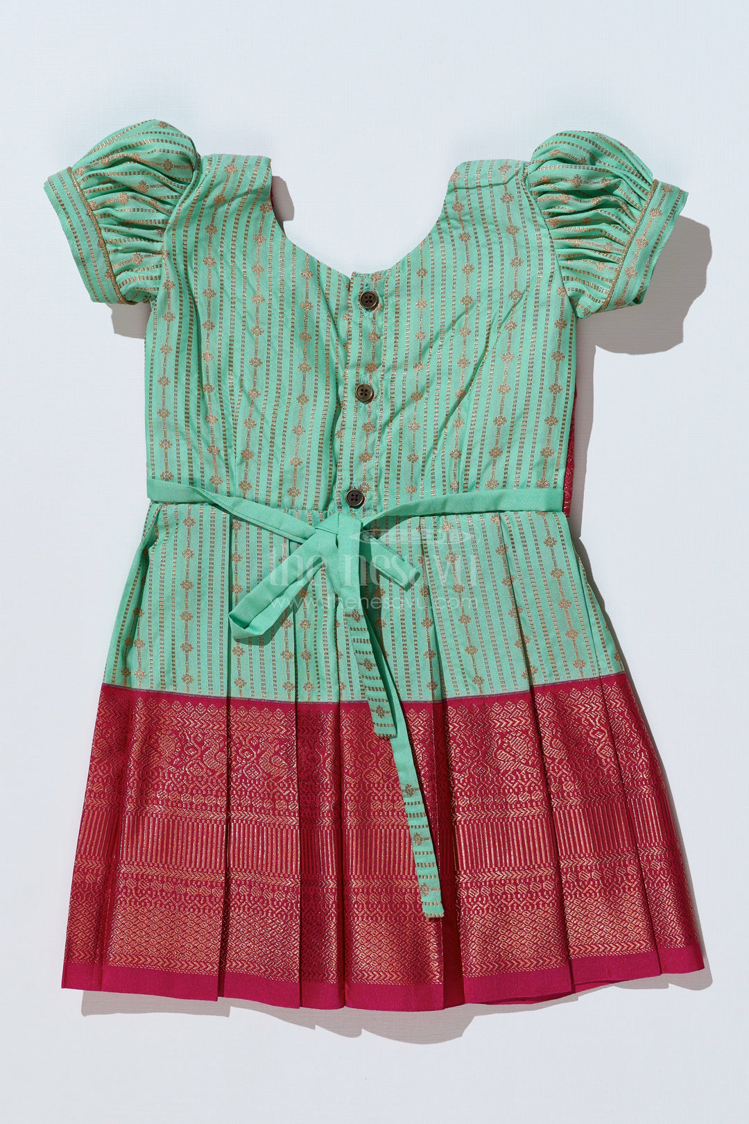 The Nesavu Girls Kanchi Silk Frock Graceful Light Green Silk Dress for Girls with Kanchipuram Inspired Design and Zari Pleated Border Nesavu Light Green Silk Dress Girls Kanchipuram Inspired Design Zari Pleated Border | The Nesavu
