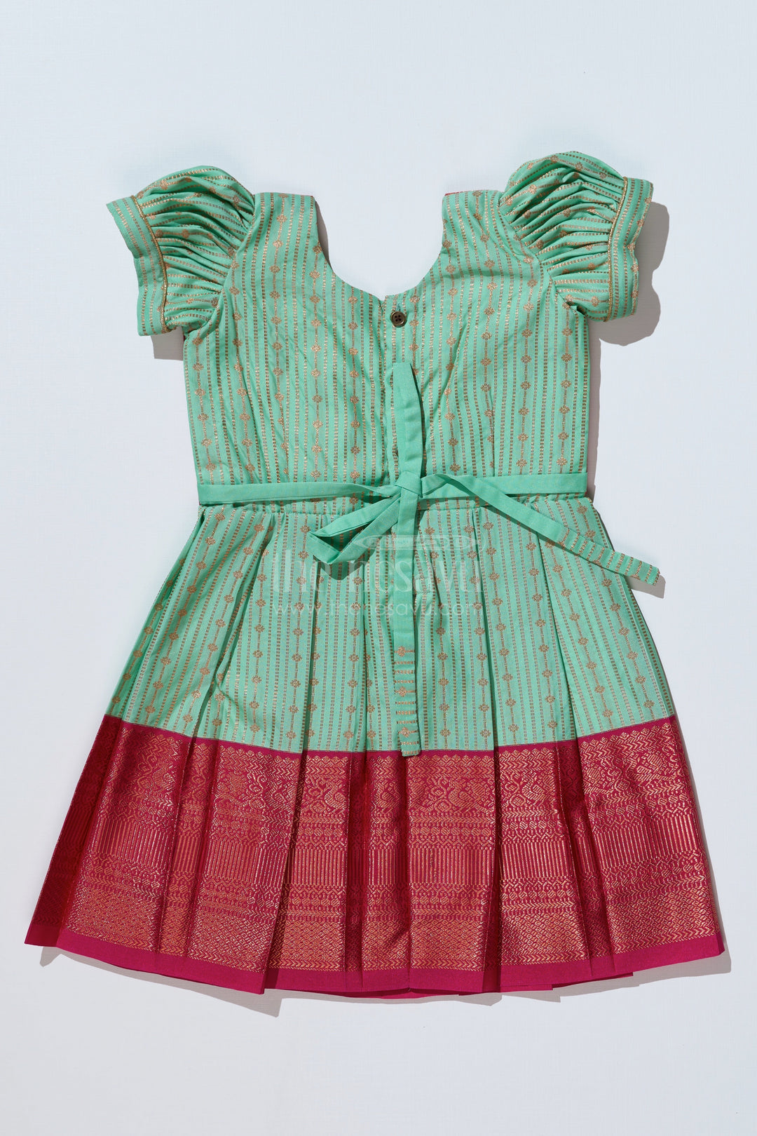 The Nesavu Girls Kanchi Silk Frock Graceful Light Green Silk Dress for Girls with Kanchipuram Inspired Design and Zari Pleated Border Nesavu Light Green Silk Dress Girls Kanchipuram Inspired Design Zari Pleated Border | The Nesavu