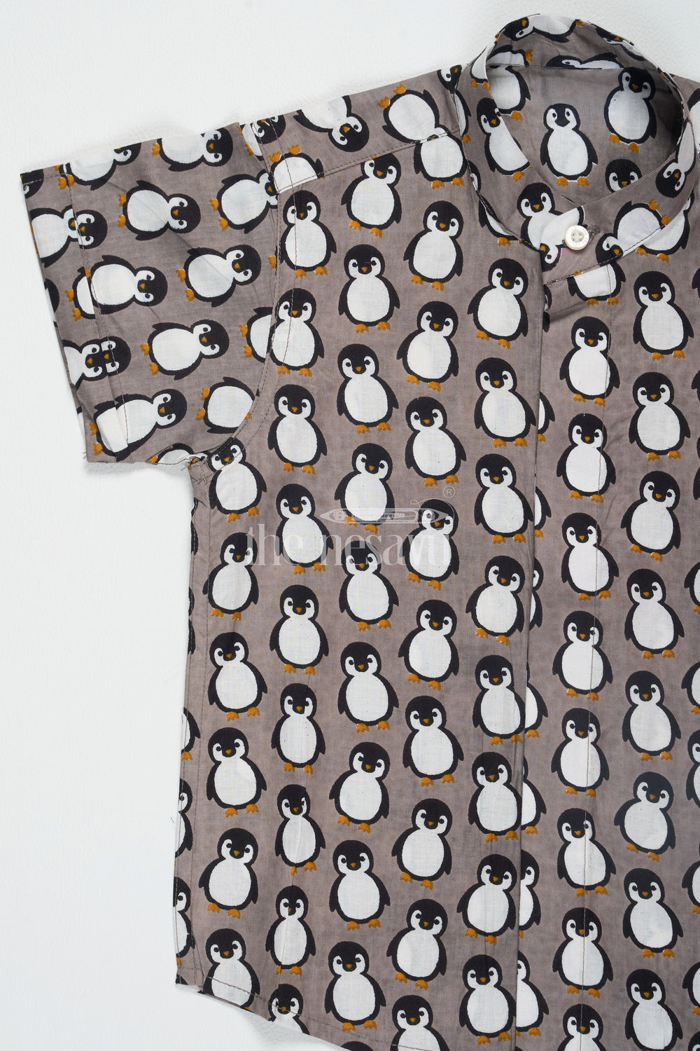 The Nesavu Boys Cotton Shirt Gray Boys Cotton Shirt with Penguin Print Half Sleeves Casual Stylish Look Nesavu Gray Boys Cotton Shirt Penguin Print Nesavu Comfortable Half Sleeves Casual Wear Family Events