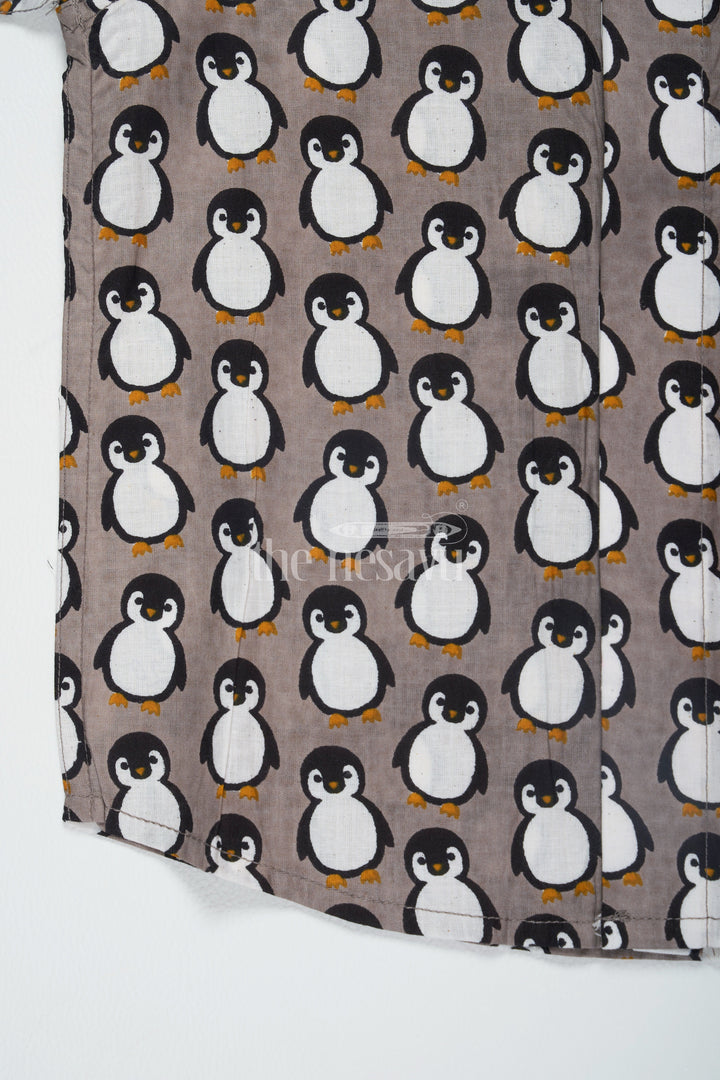 The Nesavu Boys Cotton Shirt Gray Boys Cotton Shirt with Penguin Print Half Sleeves Casual Stylish Look Nesavu Gray Boys Cotton Shirt Penguin Print Nesavu Comfortable Half Sleeves Casual Wear Family Events