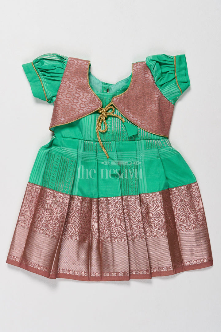 The Nesavu Girls Kanchi Silk Frock Green and Bronze Pattu Pavadai Frock Model for Girls with Golden Lace Nesavu 14 (6M) / Green SF814E-14 Nesavus Green Bronze Pattu Pavadai Frock Model Girls Elegant Cape Design