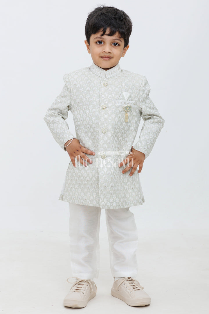 The Nesavu Boys Sherwani Green Blended Silk Boys Sherwani Set with Cream Pants Nesavu Green Boys Sherwani Set Jacquard Kurta Cream Pants Weddings Celebrations