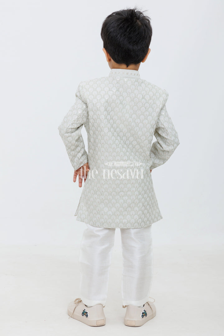 The Nesavu Boys Sherwani Green Blended Silk Boys Sherwani Set with Cream Pants Nesavu Green Boys Sherwani Set Jacquard Kurta Cream Pants Weddings Celebrations