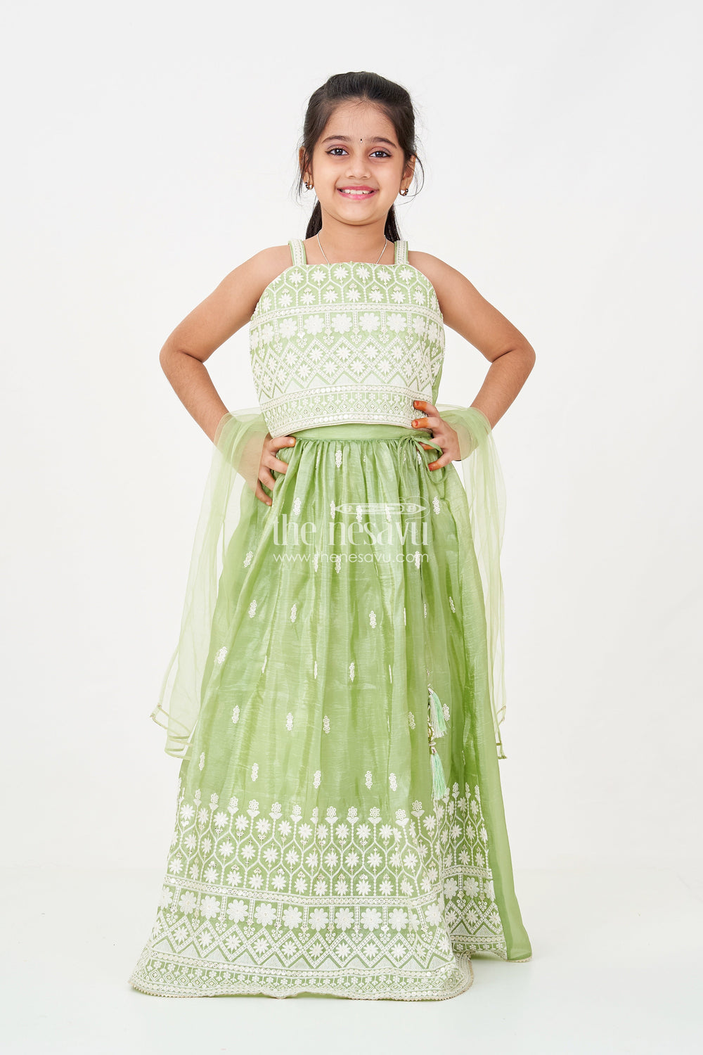 The Nesavu Girls Ethnic Lehenga Green Color Lehenga Choli for Girls in Organza with Embroidered Yoke and Tassel Detail Nesavu Nesavu Green Color Girls Lehenga Choli Organza Thread Embroidery Dupatta