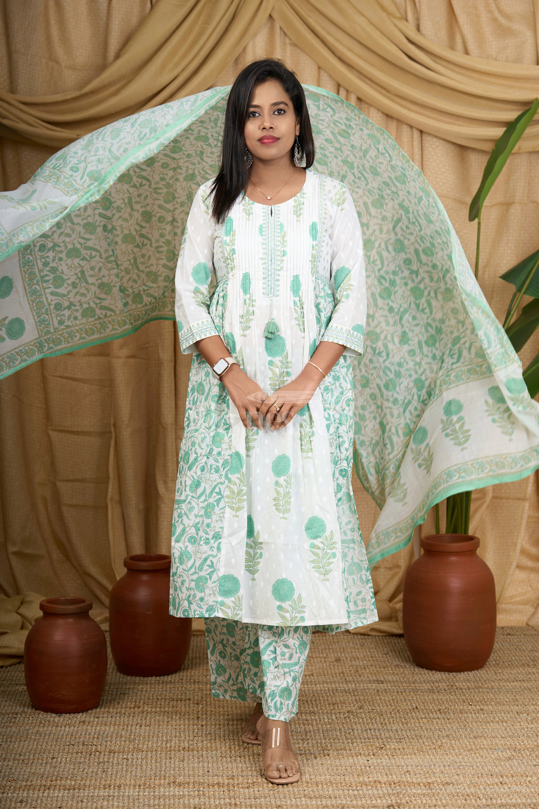 The Nesavu Womens Flared Suit Sets Green Jaipuri Cotton Kurti Set with Floral Patterns and Elegant Tassel Detailing for Women Nesavu Nesavu Green Jaipuri Cotton Kurti Set Floral Detailing Coordinated Bottom Women