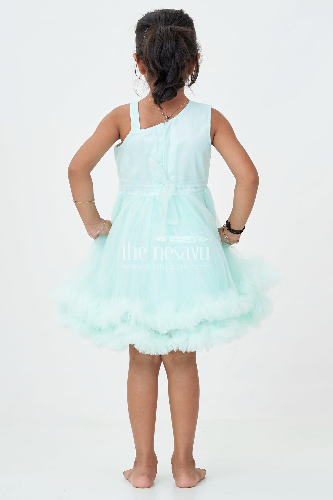 The Nesavu Girls Fancy Party Frock Green Party Dress Short for Girls in Net with Sparkle Yoke and Elegant Tulle Ruffle Skirt Nesavu Green Party Dress Short Girls Sequin Yoke Layered Net Skirt | The Nesavu