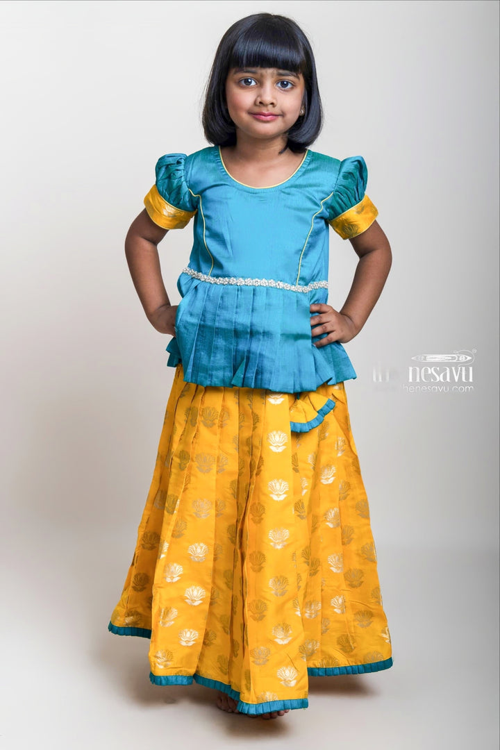 Green Pleated Peplum Blouse And Brocade Printed Yellow Silk Skirt For Girls