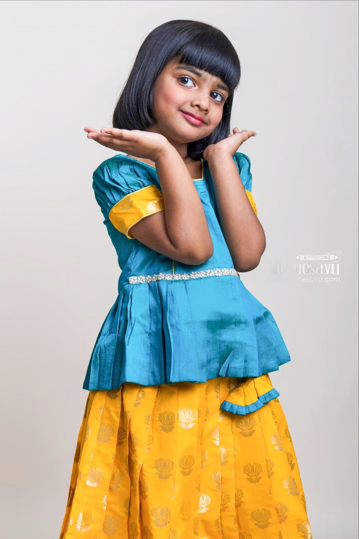 Green Pleated Peplum Blouse And Brocade Printed Yellow Silk Skirt For Girls