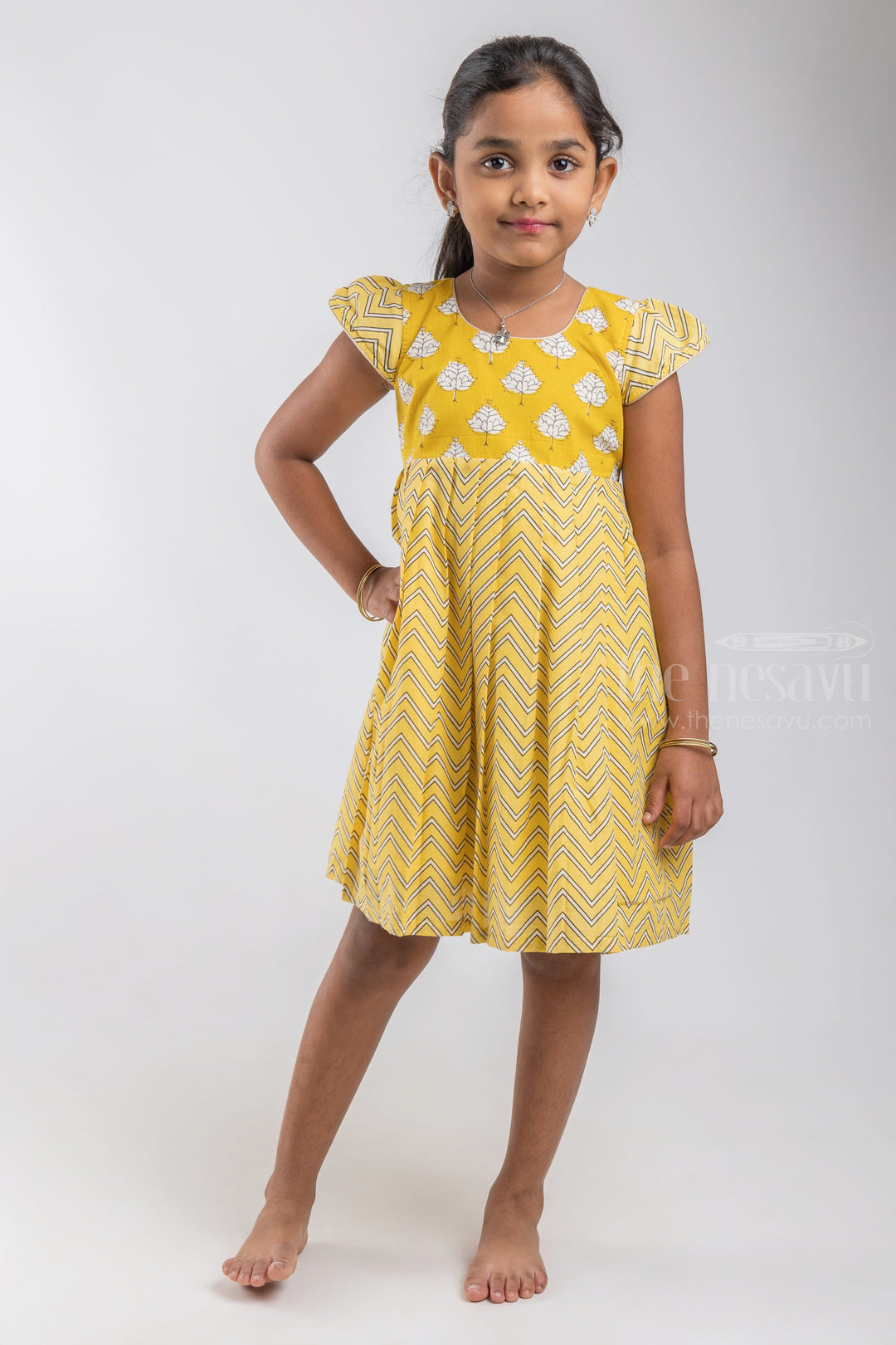 The Nesavu Girls Cotton Frock Greenish Yellow Printed Cotton Gown For Baby Girls Nesavu Yellow Soft Cotton Frock | Birthday Dress Design Ideas | The Nesavu