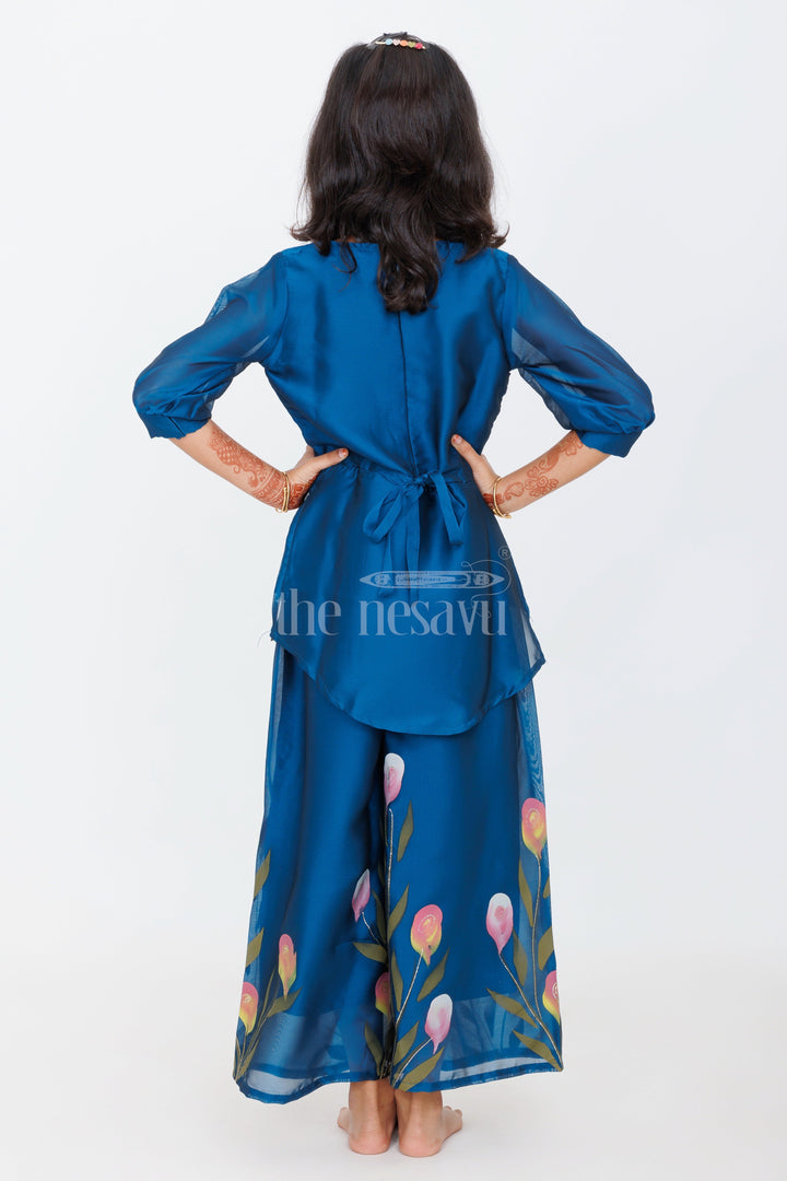 The Nesavu Girls Sharara / Plazo Set Hand-Painted Blue Organza Silk Sharara Set for Girls with Floral Motifs and Beaded Neckline Nesavu Nesavu Hand-Painted Blue Organza Silk Sharara Set Girls Floral Motifs Beadwork