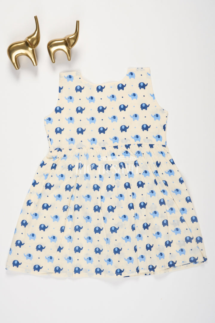 The Nesavu Baby Cotton Frocks Indigo Elephant Motif Baby Cotton Frock with Mockwrap Neckline and Button Detail Nesavu Indigo Elephant Motif Baby Cotton Frock with Mockwrap Neckline and Button Detail Nesavu