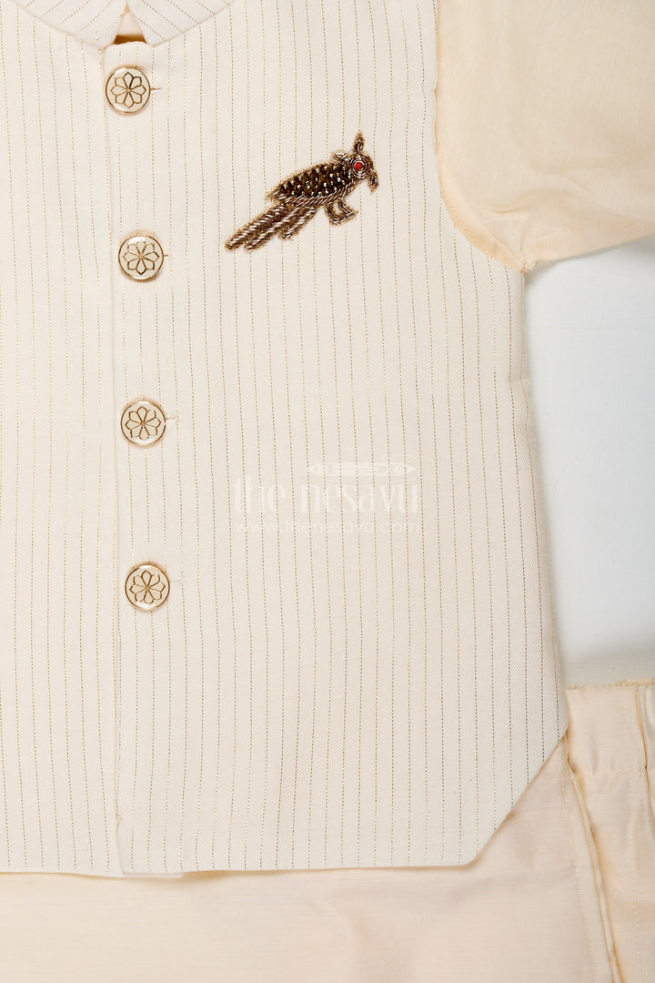 The Nesavu Boys Kurtha Set Ivory Kurta Set for Boys in Silk Blend with Designer Brooch Embellishment and Straight-Cut Pants Nesavu Ivory Kurta Set for Boys in Silk Blend with Brooch Embellishment and Stylish Jacket Design | The Nesavu