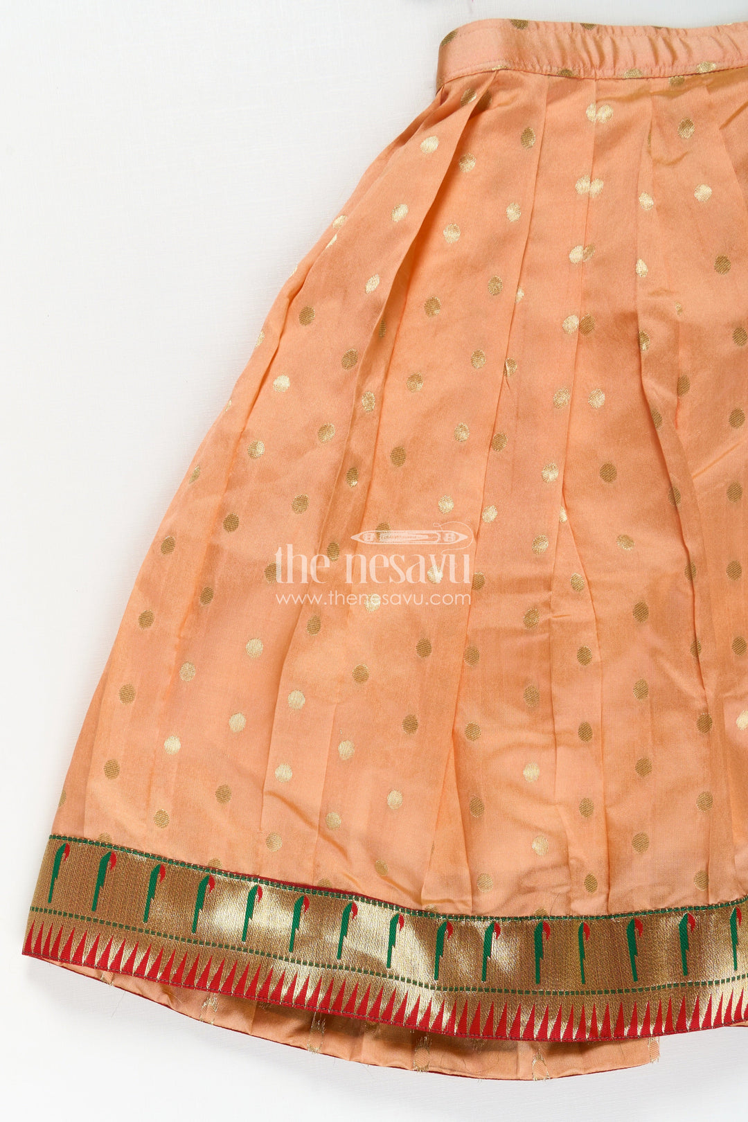 The Nesavu Pattu Pavadai Lehenga Pattu Pavadai for Girls in Orange and Green with Paithani Embellished Banaras Skirt Nesavu Lehenga Pattu Pavadai Girls Semi Banaras Skirt Paithani Border Orange Green | The Nesavu