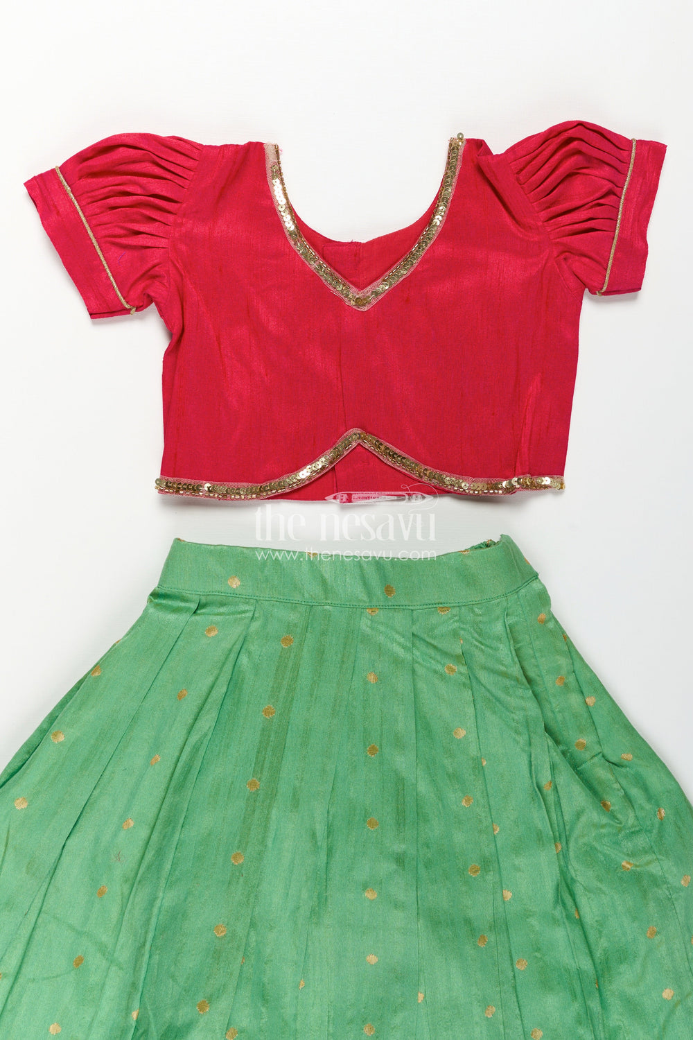 The Nesavu Pattu Pavadai Lehenga Pavadai for Girls in Green and Pink with Paithani Embellished Banaras Silk Finish Nesavu Lehenga Pavadai Girls Green Pink Paithani Embellished Raw Silk Banaras Detailing | The Nesavu