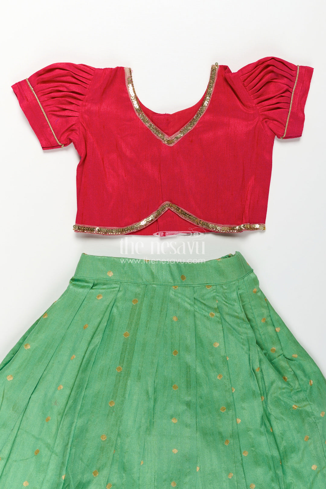 The Nesavu Pattu Pavadai Lehenga Pavadai for Girls in Green and Pink with Paithani Embellished Banaras Silk Finish Nesavu Lehenga Pavadai Girls Green Pink Paithani Embellished Raw Silk Banaras Detailing | The Nesavu